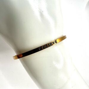 Gold tone Believe inspirational open cuff bracelet